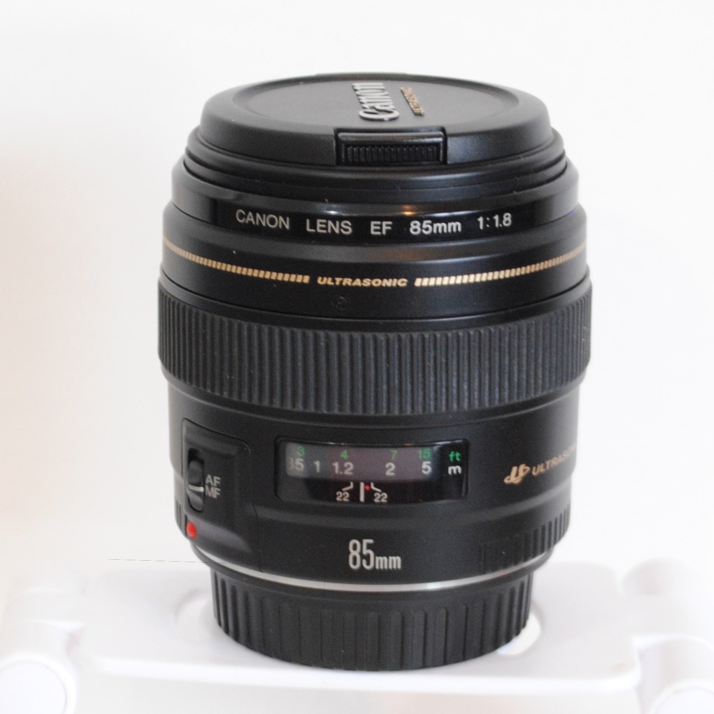 Canon EF 85mm f/1.8 USM on white background