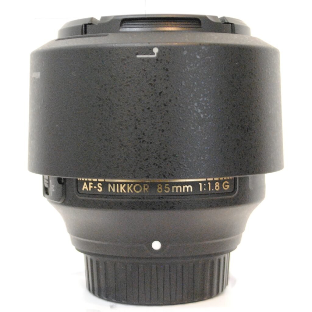 Nikon AF-S 85mm 1.8G on white background
