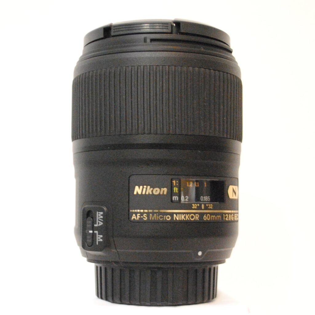Nikon Micro 60mm F1:2.8G SWM ED on a white background